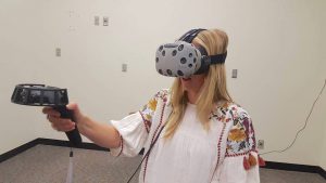 student with VR goggles