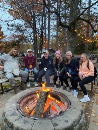 students around campfire